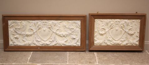 Two framed plaster panels, by repute from the Theatre Royal, London, each cast in relief with a