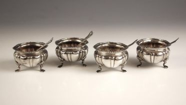 A set of four Edwardian silver open salts, Edward Barnard and Sons Ltd, London 1901, the shaped