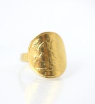 A half sovereign mounted ring, dated 1898, mounted upon associated 18ct yellow gold shank, ring size