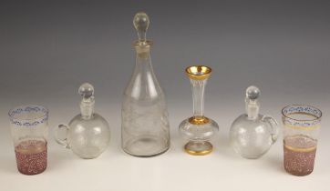 A selection of glassware, late 19th century and later, comprising: a pair of glass decanters of