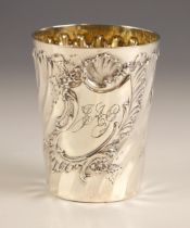 A Victorian silver beaker, Lambert and Co, London 1894, the wrythen embossed body with monogram to