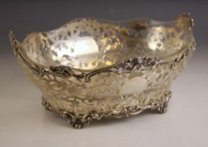 A Victorian silver rose bowl, Carrington and Co, London 1900, the shaped rim with cast rose detail