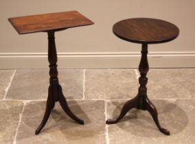 A 19th century oak tripod table, the circular top upon a baluster column and three cabriole supports