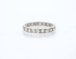 An early 20th century diamond full eternity ring, the twenty two mixed cut diamonds set in white