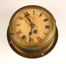 A brass bulkhead timepiece, early 20th century, the 14cm painted dial applied with Roman numerals