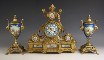 A French Japy Freres gilt metal and bleu celeste porcelain clock garniture, late 19th century, the