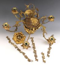 An Italian Rococo style gilt-metal chandelier, 19th century, modelled with six scrolled acanthus