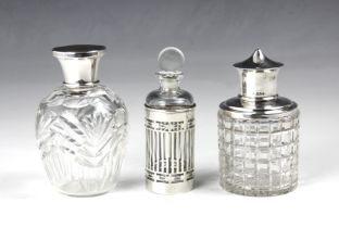 A cased set of George V silver mounted dressing table jars, Henry Perkins & Sons, London 1929, the