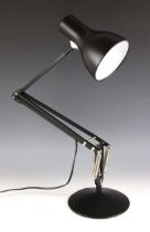 A modern Anglepoise Type 75 Desk Lamp in matt black, with push-button on/off switch to back of