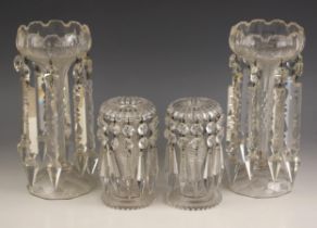 A pair of Victorian cut glass lustres, of typical form, each with monteith style rim suspending