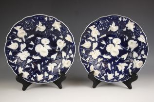 A pair of Meissen porcelain dishes, 19th century, decorated in relief with scrolling convolvulus