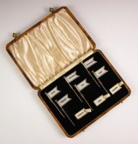 A cased set of six sterling silver sandwich flags or labels by Amnora, early 20th century, the six