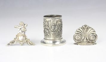 A Dutch silver plated pen tidy, of cylindrical form, embossed with figures and animals, upon a