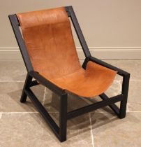 An Nkuku sling chair, late 20th century, the tan leather seats upon a painted box section frame,