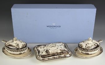 A Wedgwood Queen’s Ware sauceboat, cover and spoon, along with a further sauceboat, cover and spoon,