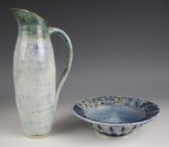 A Carol McLaghlan studio pottery stoneware jug, the body in a blue and green glaze, maker’s mark