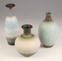 David James White (British, 1934-2011), a studio pottery Raku posy vase, of globular form, the