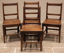 A set of four oak rail back country chairs, early 19th century, each with twin rails over a board