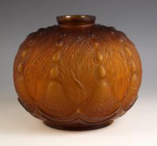 An Art Deco moulded amber glass vase by Oreor, early 20th century, of compressed globe form, the
