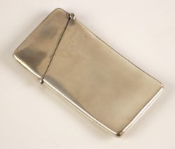 An Edwardian silver card case, William Neale, Chester 1907, of plain polished concave form with