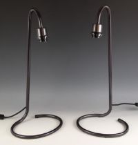 A pair of Chelsom 'Scroll' table lamps, each in black bronze finish, with scroll base, each 60cm