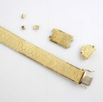 A yellow metal bracelet, the flat brick link bracelet with hidden box and tongue fastening, box