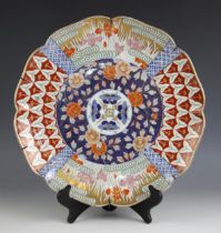 A Japanese Imari porcelain charger, 20th century, of lobed circular form and extensively decorated