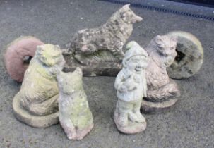 Five reconstituted stone garden ornaments, to include two cats and a dog, the tallest 33cm high,