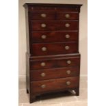 A George III mahogany chest on chest, the moulded cornice over a frieze inlaid with satinwood