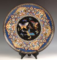 A large Chinese cloisonne charger, 19th century, the large circular charger centrally decorated with