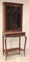 An Edwardian mahogany Chinese Chippendale revival mahogany display cabinet, the moulded cornice over