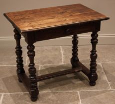 An early 18th century walnut side table, the rectangular moulded top over a single frieze drawer,