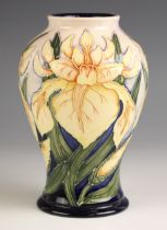A Moorcroft ‘Windrush Yellow Iris’ vase, of baluster form, the body decorated to a cream ground,