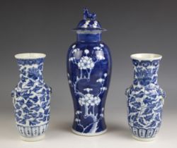 A pair of Chinese porcelain blue and white vases, 20th century, each of cylindrical baluster form