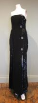 A late 1980s black crepe with solid sequinned back and side panels to below the hip, the skirt