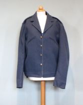 An Air Force tunic and trousers, mid 20th century, with an air force blue blouson top and