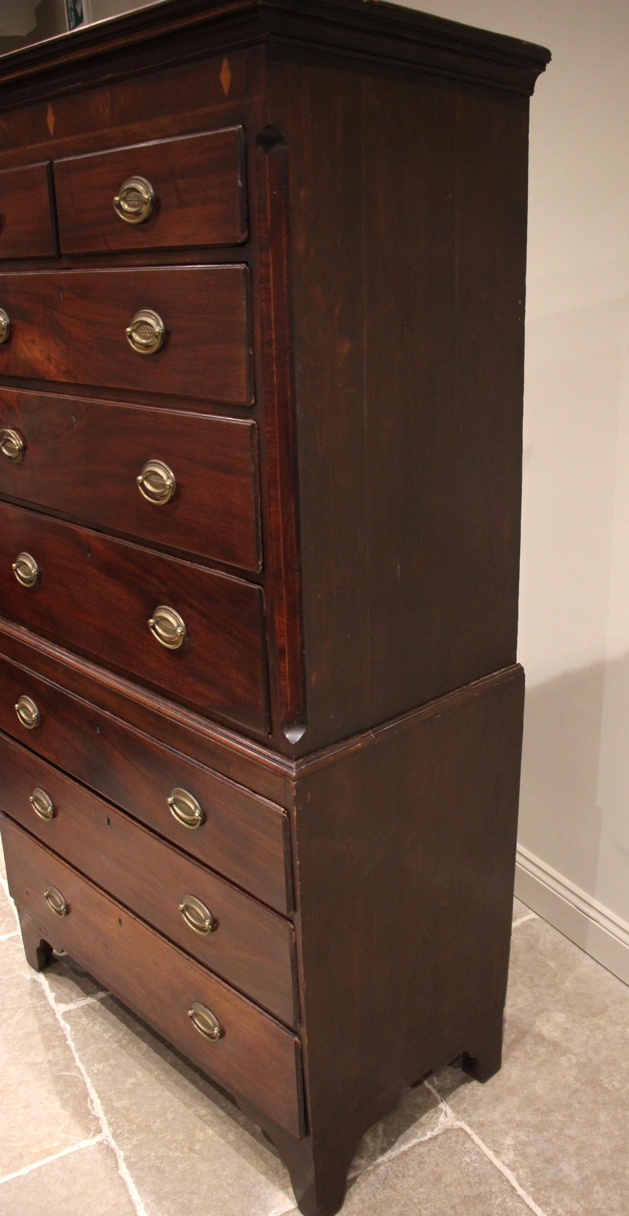 A George III mahogany chest on chest, the moulded cornice over a frieze inlaid with satinwood - Image 2 of 3