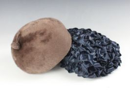 A 1960s mushroom fur felt beret style hat, labelled 'Miss Dior licensed chapeux'. with a navy blue