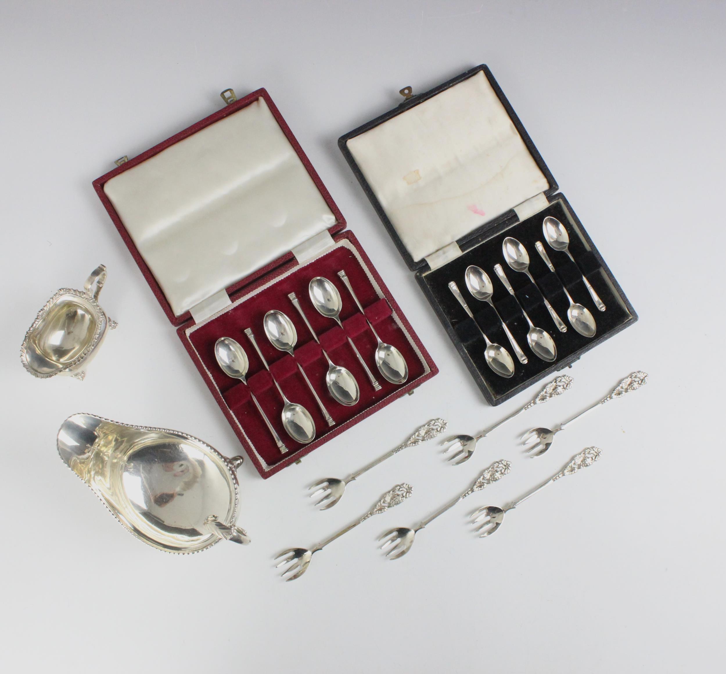 A selection of silver items, including a George V silver sauce boat, J B Chatterley & Sons Ltd,