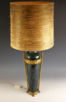 A modern neoclassical-style pottery and gilt metal table lamp, the mottled green glazed body set