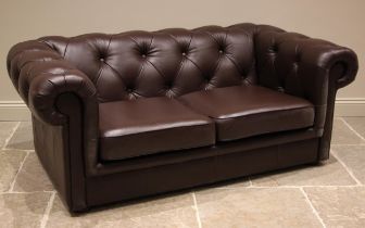 A nut brown leather Chesterfield sofa, late 20th/early 21st century, of typical deep seated form,