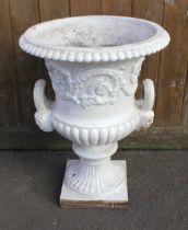 A Victorian cast iron campana urn in the manner of Andrew Handyside, of typical form, the