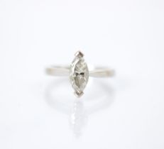 A untested marquise cut diamond solitaire, the diamond set with rubover setting to each terminal