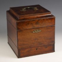 A George III mahogany apothecary box, the hinged cover with a brass swan neck swing handle opening