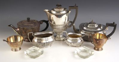 An Art Deco style silver plated tea service, comprising hot water jug, tea pot, sugar bowl and