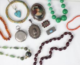 A selection of costume jewellery, including a 19th century garnet set brooch, foiled back (at fault)