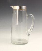 A George VI silver mounted pitcher, ‘J&S’ Birmingham 1945, the plain polished mount upon the tapered