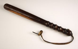 A coromandel police truncheon, 20th century, with engraved crown over L.C.C, the markings for