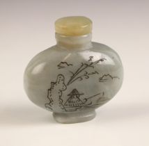 A Chinese carved and polished hardstone snuff bottle and stopper, 20th century, the oval shaped