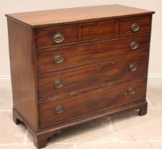 A late George III mahogany chest of drawers, formed with three short over three long graduated and
